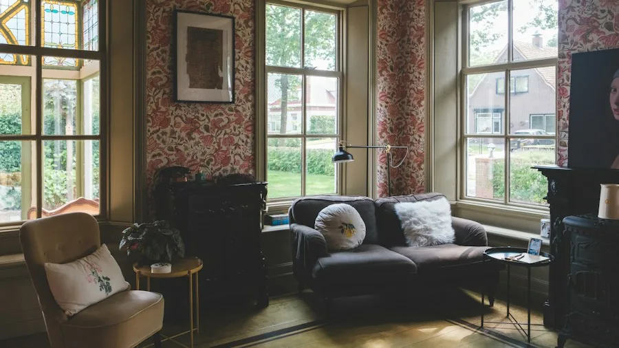 Modern accent chair in a bright living room with natural lighting and home decor elements