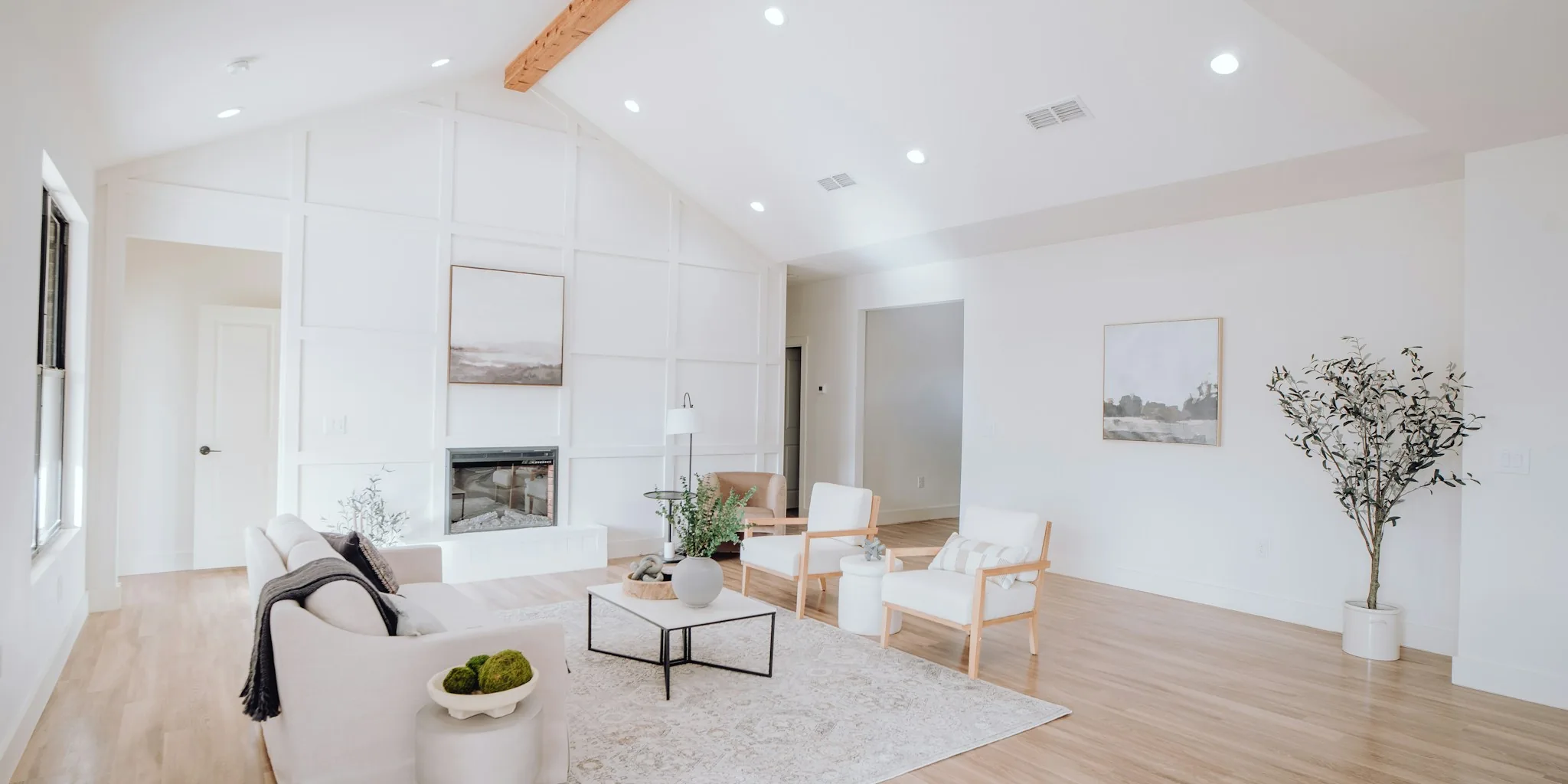 Modern air purifier running in a bright living room with natural light